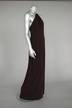 Lot 237 - A Halston black crepe jersey evening gown with...