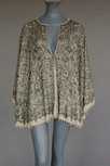 Lot 93 - A Mariano Fortuny stencilled silk batwing...