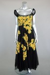Lot 122 - Three 1930s summer gowns, comprising: black...