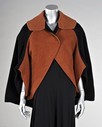 Lot 120 - A Charles James black wool and terracotta...