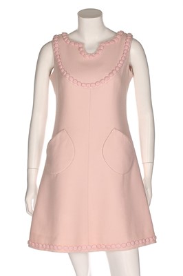 Lot 229 - An André Courrèges couture pink wool cocktail...