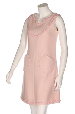 Lot 229 - An André Courrèges couture pink wool cocktail...