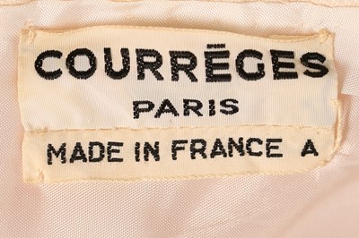 Lot 229 - An André Courrèges couture pink wool cocktail...
