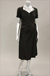 Lot 79 - A black silk faille dinner dress with Piguet...
