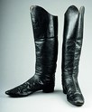 Lot 17 - A pair of black leather boots, 1850s-60s, left...