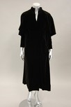 Lot 80 - A Balenciaga couture black velvet redingote,...