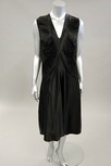 Lot 68 - A Nina Ricci pleated black satin cocktail...