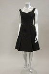 Lot 83 - A Maggy Rouff couture black pleated taffeta...