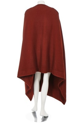 Lot 149 - A Sybilla pour Gibo brick-red wool cloak,...