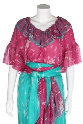 Lot 160 - An Yves Saint Laurent couture printed pink and...