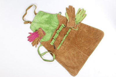 Lot 327 - An Hermès suede gardening apron and gloves,...