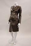 Lot 133 - A Gucci black leather suit, the fitted...