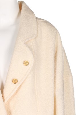 Lot 5 - A Chanel cream bouclé wool oversized jacket,...