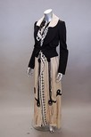 Lot 174 - A Comme des Garcons black fitted jacket, with...