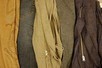 Lot 214 - A group of jeans, casual trousers and shirts,...