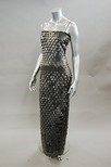 Lot 222 - A Colette Dinnigan silver scale-effect cutwork...