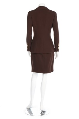 Lot 144 - A Chanel brown wool suit, Autumn-Winter 1996,...
