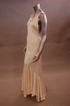 Lot 185 - A long white satin bias-cut evening gown,...
