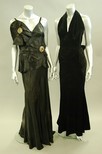 Lot 88 - A bias-cut black cir satin evening gown, early...