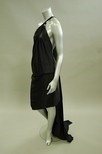 Lot 97 - A Roland Mouret slinky black satin halter-neck...