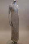 Lot 236 - A Balenciaga sequined and beaded evening gown,...