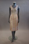 Lot 222 - A Courrges beaded and fringed evening dress,...