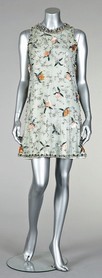 Lot 210 - A Pierre Cardin jewelled cocktail mini-dress,...