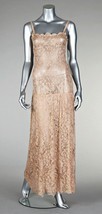 Lot 242 - An Yves Saint Laurent nude lace cocktail dress...