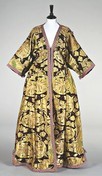 Lot 24 - A fine Bokharan/Russian brocaded robe, late...