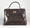 Lot 8 - An Hermès brown leather Kelly bag, late 1970s,...