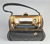 Lot 9 - A Straeter `Lite-On' black crocodile handbag,...