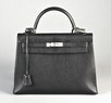 Lot 4 - A fine black Hermès black togo leather Kelly...