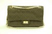 Lot 5 - A Chanel brown jersey quilted bag, 1960s, with...