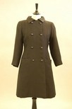 Lot 185 - A Balenciaga double breasted black wool coat,...