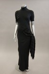 Lot 329 - A Christian Dior boutique beaded black crepe...