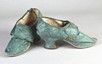 Lot 14 - A pair of green damask ladies shoes, circa...