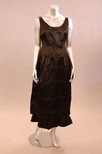 Lot 156 - A rare Nicole Groult black satin dress early...