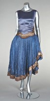 Lot 146 - A Jeanne Lanvin blue satin and lace cocktail...
