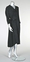 Lot 149 - A Charles James black moirdinner dress, late...