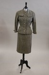 Lot 176 - A Pierre Balmain grey tweed suit, circa 1950,...