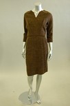 Lot 205 - A Hardy Amies black and brown flecked tweed...