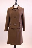 Lot 192 - A Pierre Balmain brown wool suit, mid 1960s,...