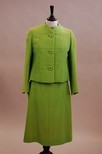 Lot 197 - A Pierre Balmain bright green tailored suit,...