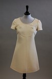Lot 214 - A Courrges cream wool mini-dress, mid 1960s,...