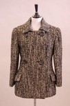 Lot 187 - A Pierre Balmain black and white tweed jacket,...