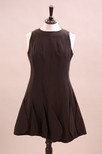 Lot 201 - A Pierre Cardin black crepe mini, 1960s, with...