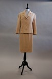 Lot 217 - A Pierre Balmain caramel boucle linen/wool...