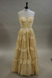 Lot 167 - A Carven pleated organza and cutwork ball gown,...