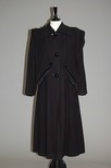 Lot 56 - A Paquin black wool coat, circa 1945, labelled,...