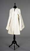 Lot 77 - A Balenciaga ivory brocatelle day dress and...